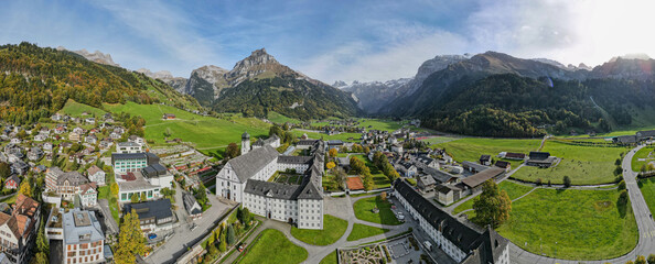 Drone view at a the convent of Engelberg in the Swiss alps - obrazy, fototapety, plakaty