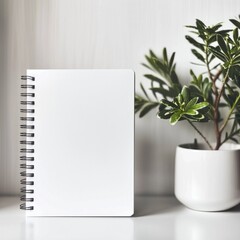 white hardcover spiral notebook with white background