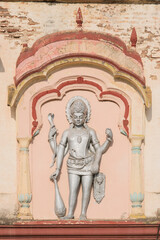 Sculpture of Dwarapal at the entrance of the Devdeveshwar temple on the Parvati Hill at Pune,...