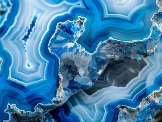 Zelfklevend Fotobehang Kristal Slice of blue agate stone texture, eye-catching composition