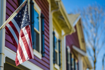 American flag on corner of residential house symbol	