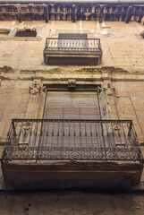 old window with a baranda in an old building in Solsona, catalonia spain