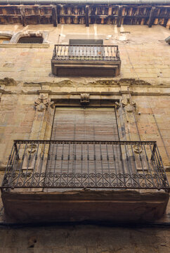 old window with a baranda in an old building in Solsona, catalonia spain