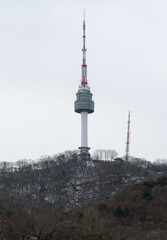 Fototapeta premium Seoul Tower, South Korea in urban city in Asia. Skyscraper and high-rise buildings.