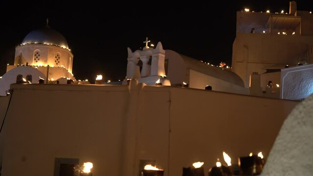 Thousands of small lanterns are burning during the local custom of Good Friday in the traditional village of Pyrgos, in Santorini island, Greece. 