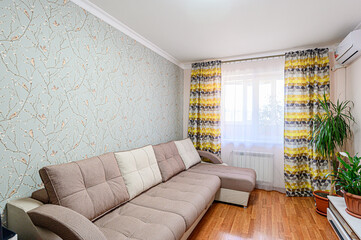 standard interior apartment. living room with sofa