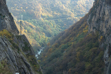 The outlines of the mountain range in autumn. A mountain gorge high in the mountains. Transmission...