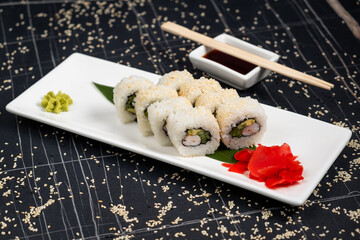 Sushi roll sushi with prawn, avocado, cream cheese, sesame. Sushi menu. Japanese food.