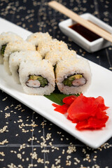 Sushi roll sushi with prawn, avocado, cream cheese, sesame. Sushi menu. Japanese food.
