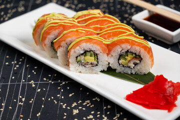 Sushi roll red Dragon on black background