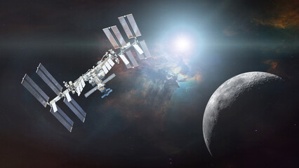 ISS in outer space with nebula on Moon background. Elements of this image furnished by NASA.