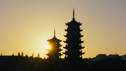 Chinese tower silhouette in the twilight, Guilin, China, Jan 2024