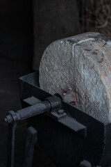 A crack on a hand grinding stone. - obrazy, fototapety, plakaty