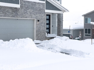 Snow-Enveloped Homes on a Quiet Suburban Street