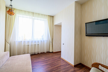 standard interior apartment. living room with sofa