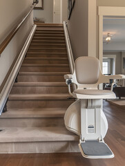 A stairlift chair curves elegantly at the staircase bottom, marrying traditional home styles with modern accessibility