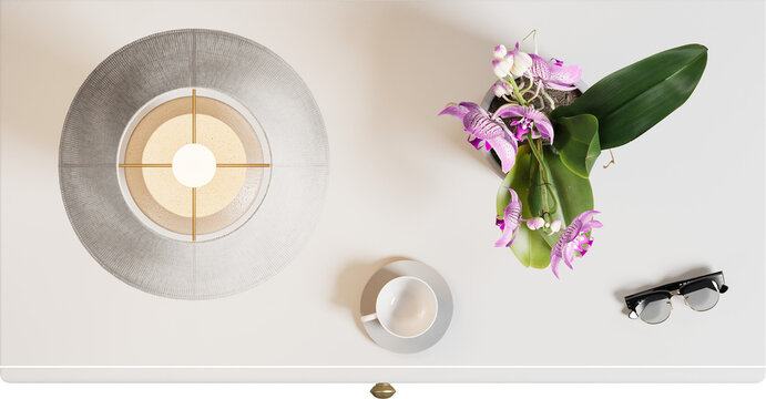 Top view of white bedside table with lamp shade