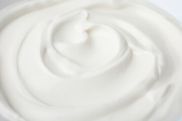 Delicious natural yogurt as background, closeup view