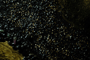 Black and golden marble textured background