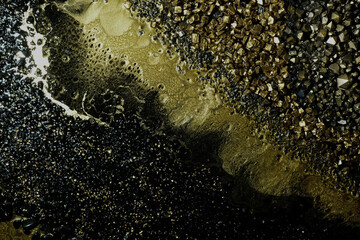 Black and golden marble textured background