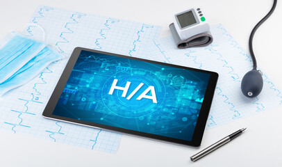 Close-up view of a tablet pc with medical abbreviation concept