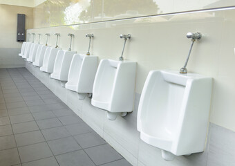 Urinal or sanitary ware. That provided on public wall of toilets for male. Users usually used in a...