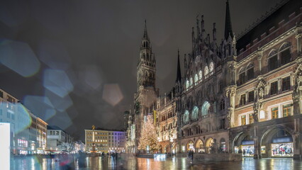 Marienplazt Old Town Square with New Town Hall night timelapse hyperlapse. Bavaria, Germany