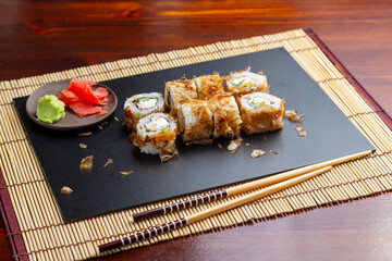 Sushi, rolls with tuna chips and crab meat. Lunch. Japanese food.