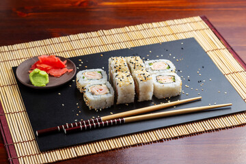 Sushi, rolls with cheese and ham. Lunch. Japanese food.