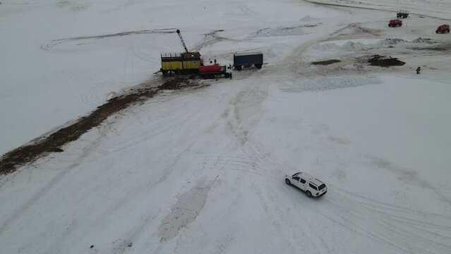 geologists in the steppe in winter
