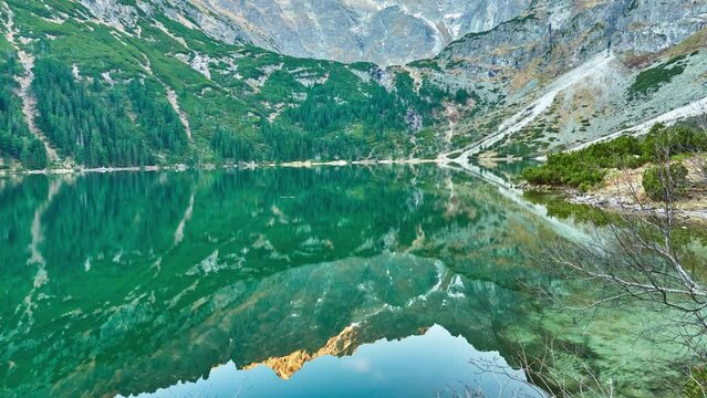Morskie Oko (Sea Eye) is largest and fourth-deepest lake in Tatra Mountains. It is located deep within Tatra National Park, Poland, in Rybi Potok (Fish Brook) Valley, at base of Mieguszowiecki Summits