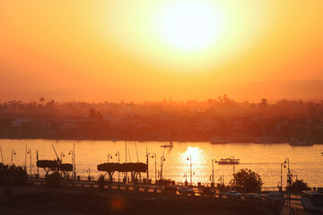 Unique sunset at Luxor Aswan Egypt. Beautiful sunset over the Nile river