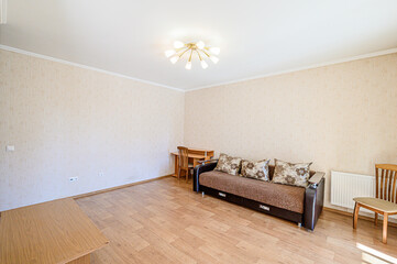 standard interior apartment. living room with sofa