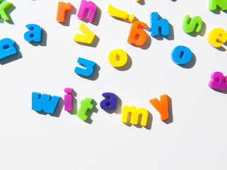 Fridge magnet letters spell " Witamy " welcome in Polish