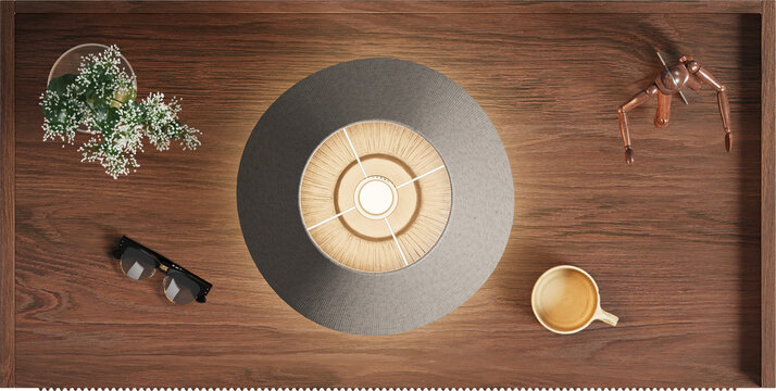 Top view of wooden bedside table with lamp shade