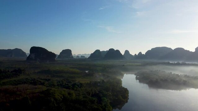 Drone Nature View of Nong Thale Lake in Krabi Thailand -beautiful limestone mountain with reflection on the lake Morning Sunrise view. Unseen In Krabi Footage Travel and Peaceful  