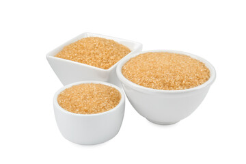 Brown sugar in bowls isolated on white
