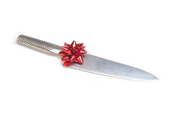 Cut out - global knife with a ribbon rosette concept practical gifts for the household