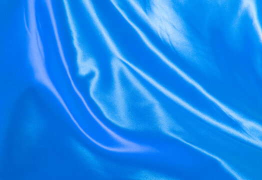 Satin fabric background blue