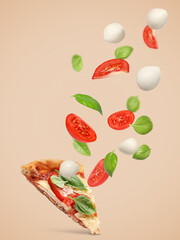 Caprese pizza and ingredients in air on dark beige background