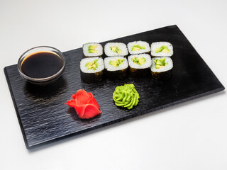 Sushi, maki rolls with avocado. Lunch. Japanese food.