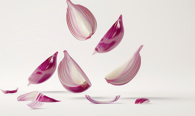sliced red onions floating in the air on the white background.
