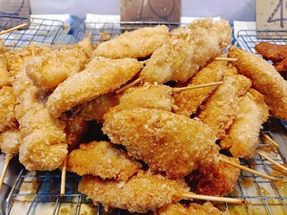fried chicken wings in the market