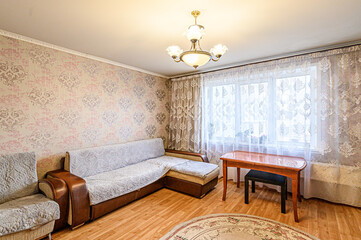 standard interior apartment. living room with sofa