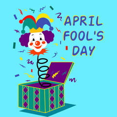 April fools day design with clown head surprise box and decorative elements on light blue background
