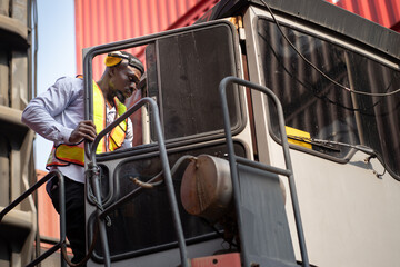 African logistic engineer man worker or foreman working and driver forklift container at container site	 - 765060377