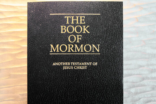 The &lsquo;Book of Mormon&rsquo; shines with golden letters, inviting readers to explore its pages offering an additional testament of Jesus Christ.