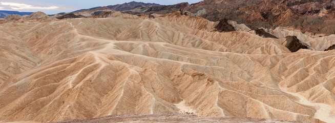 Zabriskie Point in Death Valley with colorful sediment formations