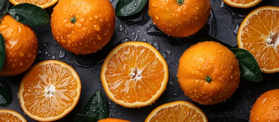 Foto op Plexiglas Wet orange in water splash. Juicy citrus fruit background. Healthy food. © elenabdesign