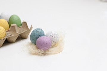 Colorful easter eggs decoration on white table background
